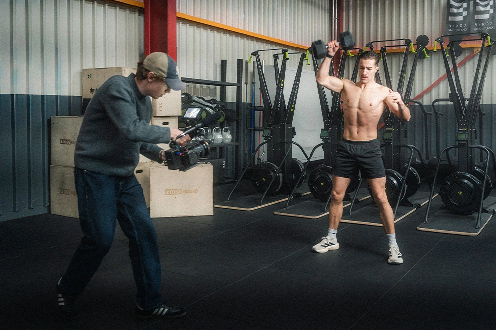 Behind the scenes from Beyond Performance documentary: Dariell Heim training inside a Swiss gym, captured by filmmaker Lua Hell