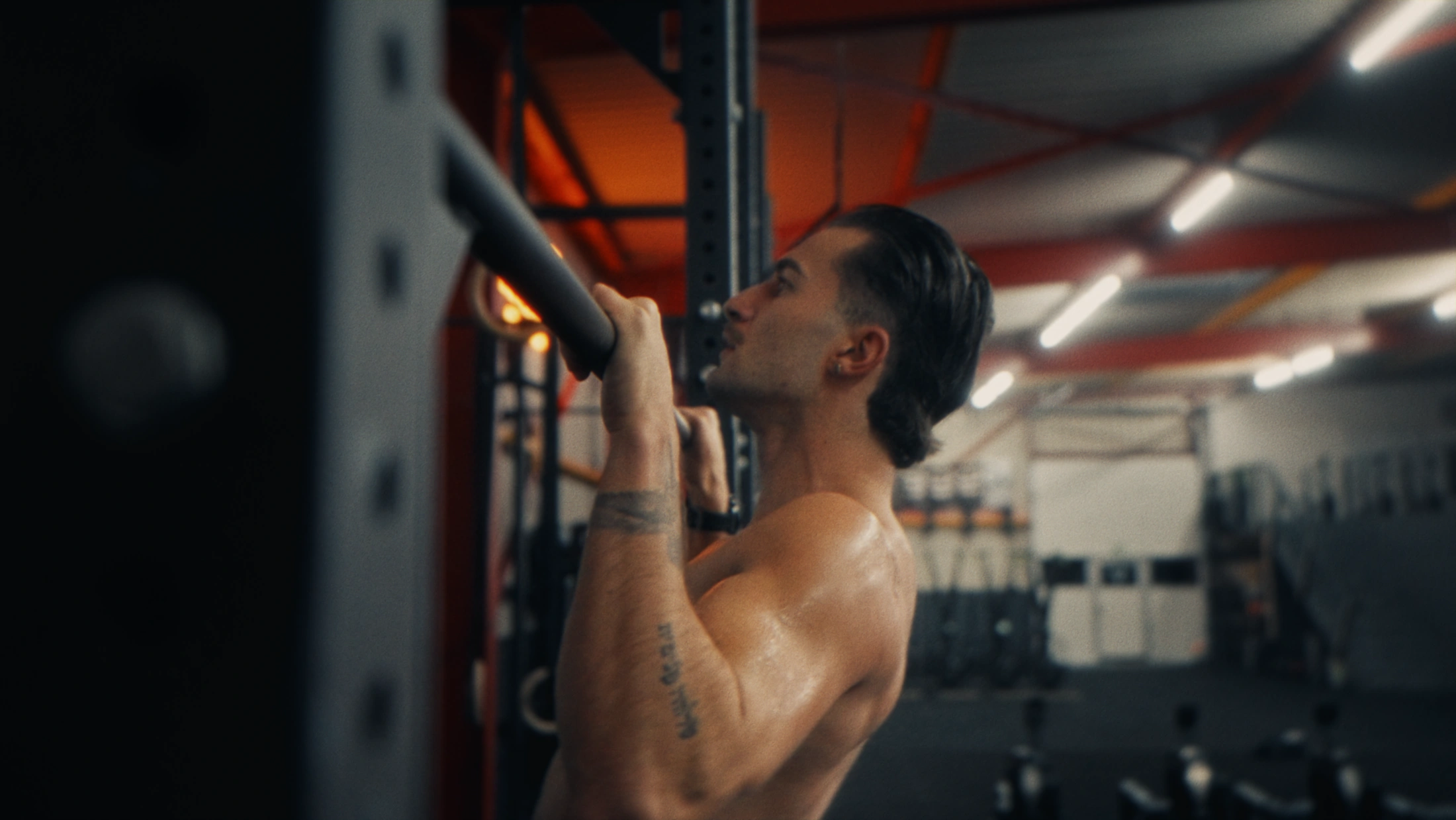Cinematic still from Beyond Performance documentary: a tense moment that speaks to the weight of pressure carried by competitive athletes