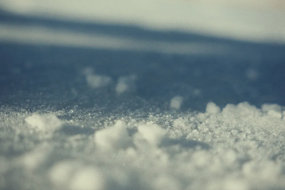 Behind the scenes from the DJI Action 6 brand video: ice skating shoot in an alpine environment with handheld and FPV cinematography by Lua Hell