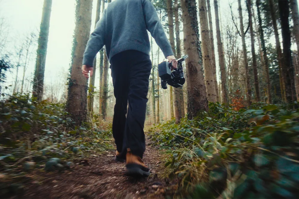 Detail shot of the K&F Concept V-Mount battery in use on a cinema camera setup during the brand reel shot by Lua Hell